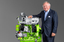 Lord Bamford pictured with JCB’s hydrogen combustion engine.